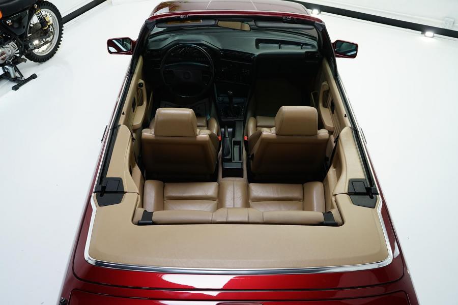 Интерьер BMW 325i Convertible (Calypso Red) 1990 года  (фото 83 из 190)